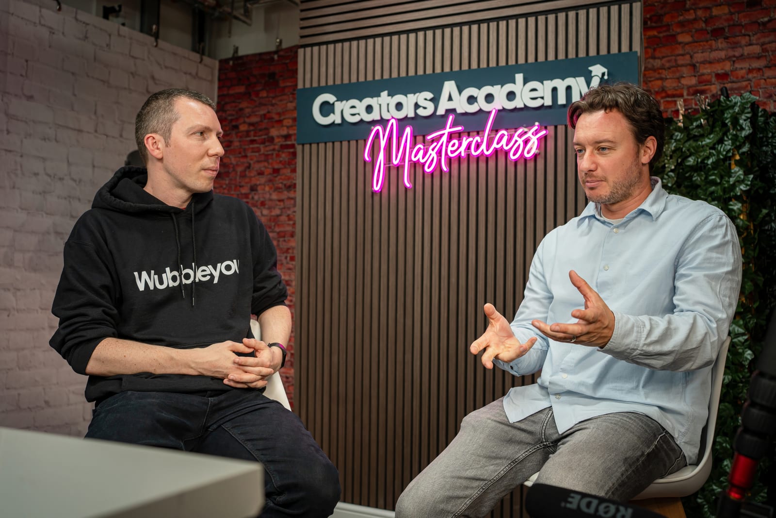 Mark Renney and Lee Daymond in conversation under the Creators Academy Masterclass sign